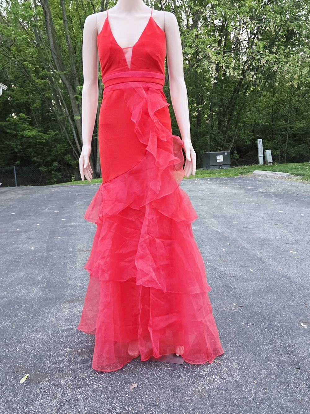 the clothing company Red Ruffled V-Neck Gown